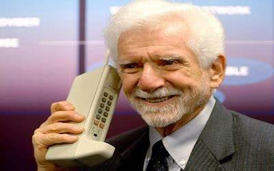 Martin Cooper and his "brick" phone on the 1G network.