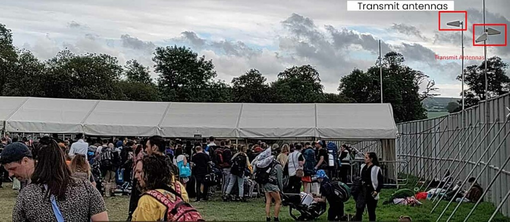 Stella Doradus antennas amplifying mobile signal at an outdoor music festival.